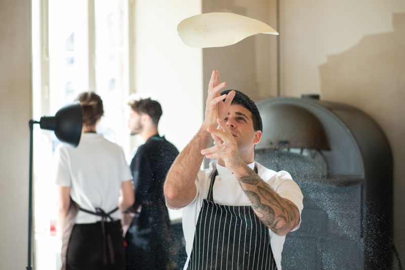 Pequod's pizza franchise kitchen operations and deep dish pizza preparation